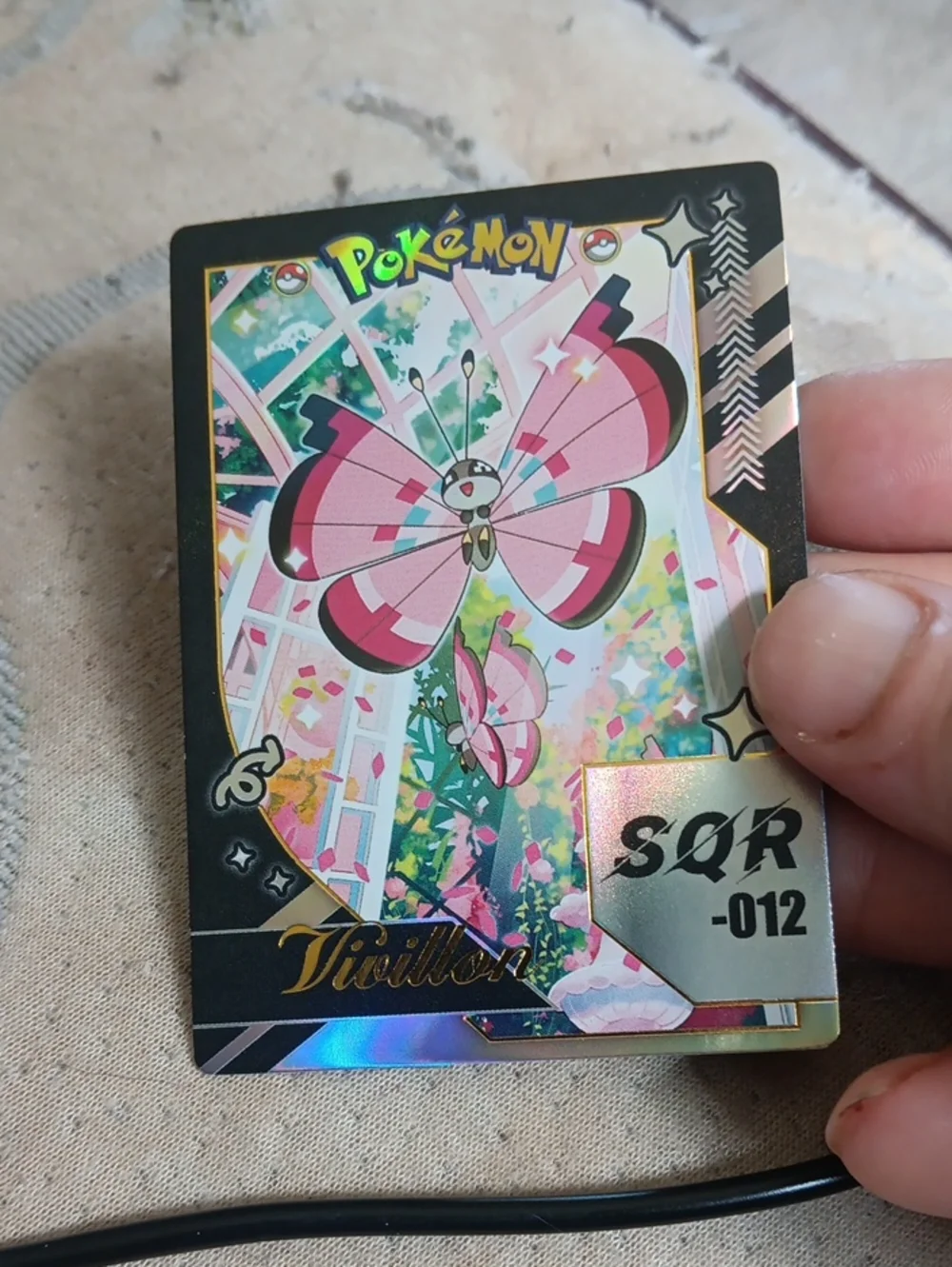 Pokemon Vivillon Holo Card - Pink & Black Accent